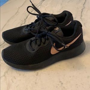 Nike tennis shoes - barely worn.